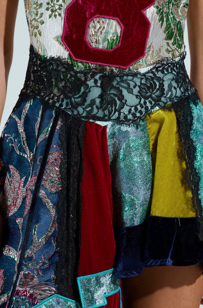 CLEAT CHASER LAYERED JERSEY HIGH LOW DRESS IN BROCADE